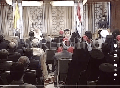 Pope John Paul II being welcomed to Syria by President Bashar al-Assad